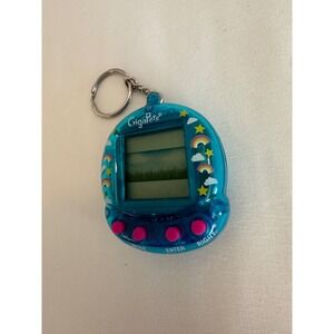 GigaPets Virtual Pet Handheld Game Translucent Blue Rainbow 1563HF01 Retro Toy